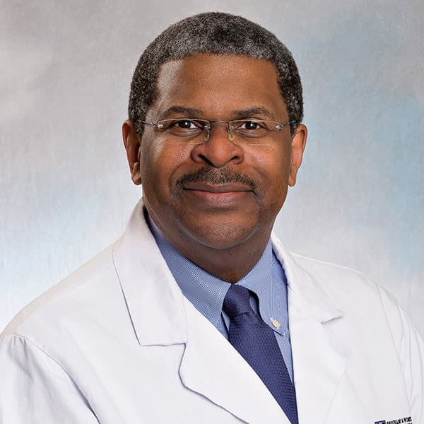 Headshot of Malcolm K. Robinson, MD, FACS.